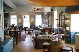 Cozy Elder Room at The Huntsman Pub, perfect for intimate meetings and small events.