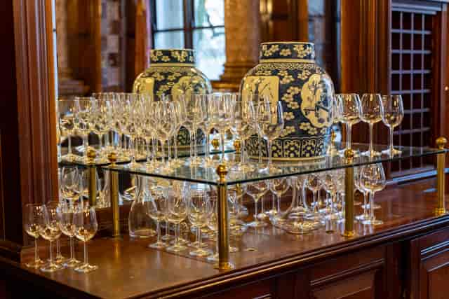 Elegant crystal glassware in the Smoking Room, perfect for upscale events and receptions.