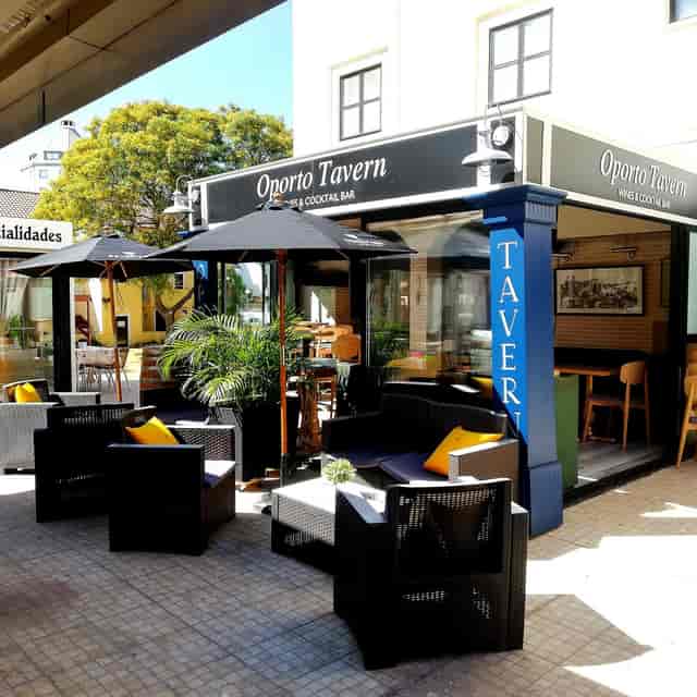 Outdoor seating at Oporto Tavern, perfect for casual meetings and networking events.