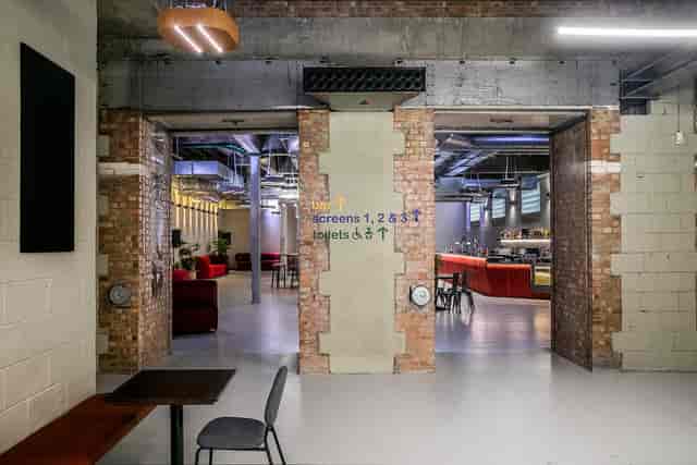 Modern Catford Mews Foyer with brick accents, perfect for meetings and events.