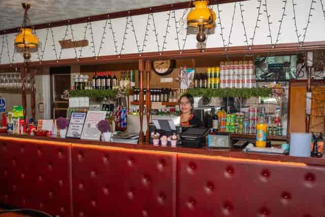 Churchill Hotel bar area with warm lighting, perfect for events and gatherings.
