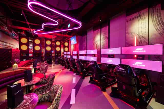 Full Venue Hire at F1 Arcade Birmingham with sleek racing simulators for events.