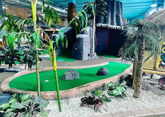 Vibrant mini-golf course in Jungle Rumble Birmingham for team-building and events.