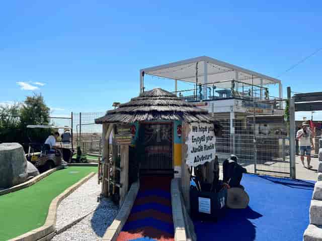Caveman Course mini-golf in Brighton, vibrant outdoor venue for team-building events.