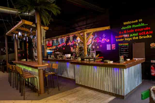 Vibrant bar area at Jungle Rumble Glasgow for networking events and social gatherings.