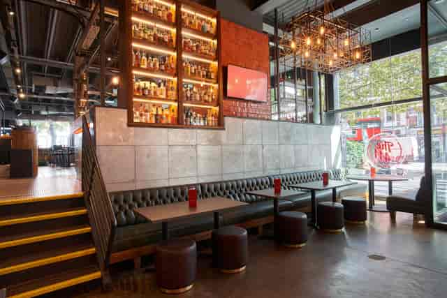 Modern Diner & Pool Room venue with natural light for casual meetings and events.
