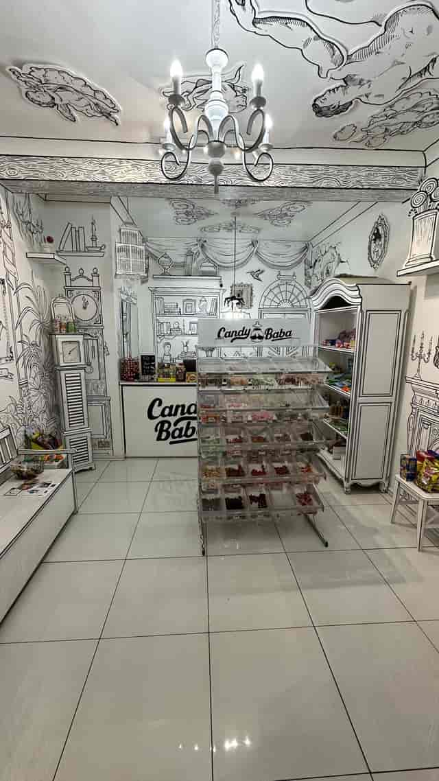 Whimsical candy shop with colorful displays, ideal for birthday parties and events.