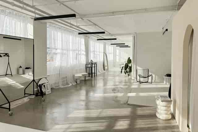 Bright, spacious Content Studio with large windows for meetings and events.