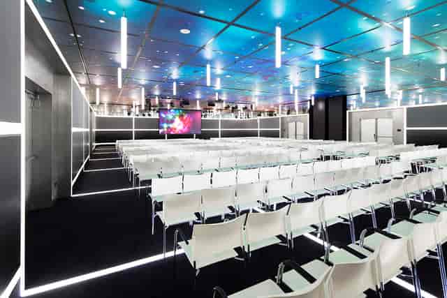 Modern event space in Jaarbeurs with sleek seating for corporate meetings and workshops.