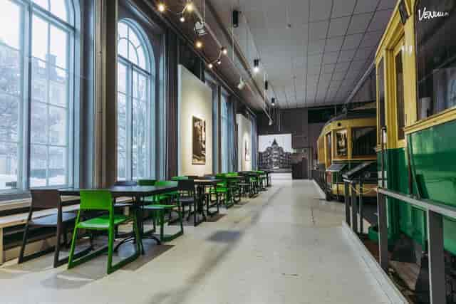 Spacious Tram Hall venue with vintage decor, ideal for meetings and events.