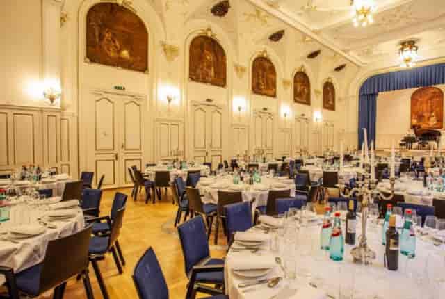 Elegant ballroom with round tables, perfect for weddings and corporate events.