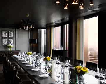 Private dining room in City Social London with elegant table setup for corporate events.