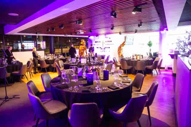 Black and White Lounge in Leeds, elegant dinner setup for corporate events.