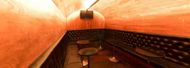Cozy lounge at Whistle Binkies, ideal for private events and gatherings.