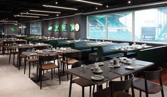 Modern dining space at Hibernian FC, ideal for corporate events and social gatherings.