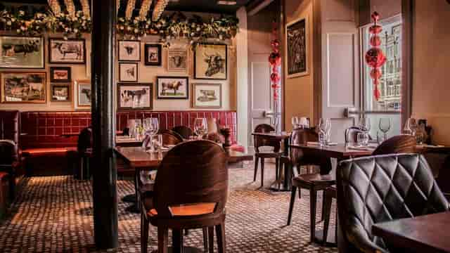 Private dining room at Kyloe Steak Restaurant, elegant decor for intimate events.