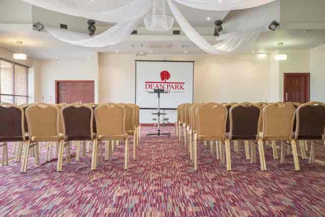 Conference Suite at Dean Park Hotel with arranged chairs for seminars and events.