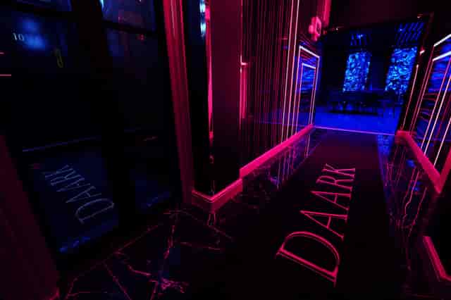 Vibrant neon entrance of Daark Venue for modern events and energetic experiences.