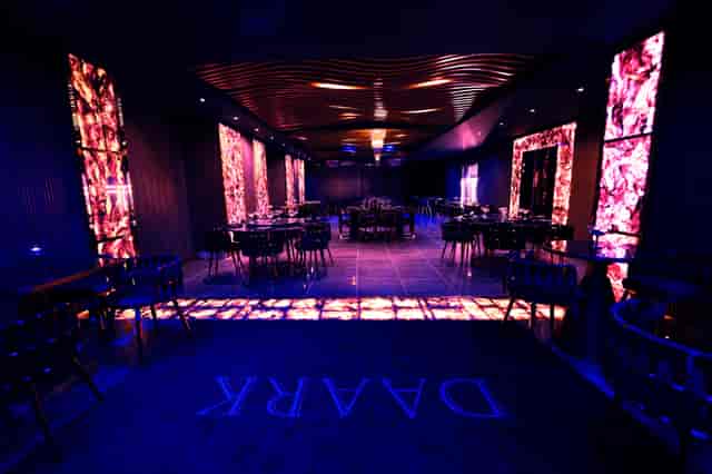 Modern event space at Daark Venue with vibrant lighting, perfect for gatherings and receptions.