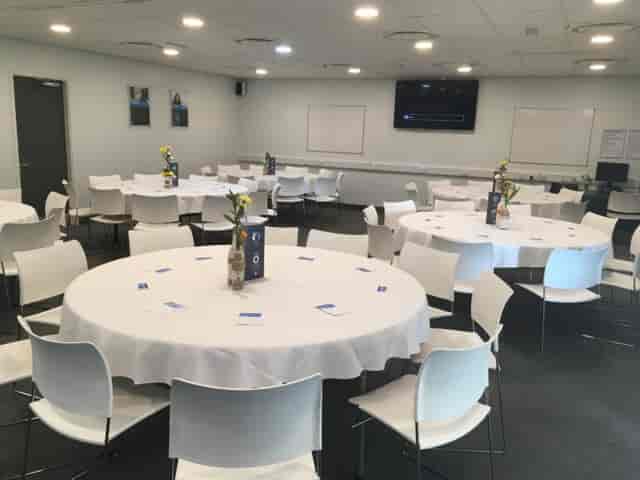 Modern conference suite at Hopwood Hall College, perfect for workshops and networking.