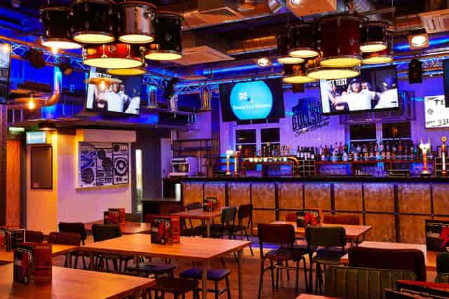 Belushi's Bar Edinburgh main space with lounge seating for corporate networking and team building.