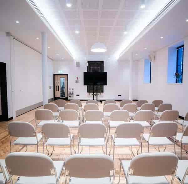 Wesleyan meeting space with modern design, ideal for presentations and workshops.