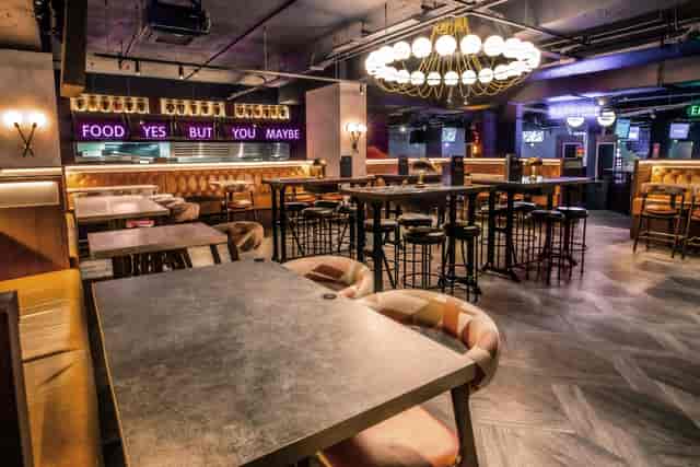 Ruby semi-private area at Puttshack Watford, ideal for casual meetings and events.
