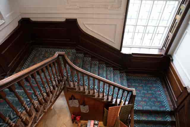 Elegant staircase at Story Lounge, perfect for events and networking.