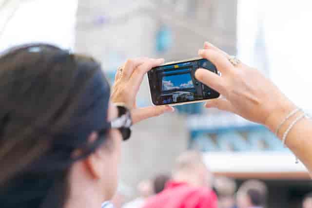 Silver Sturgeon event participant capturing moments for social sharing and engagement.