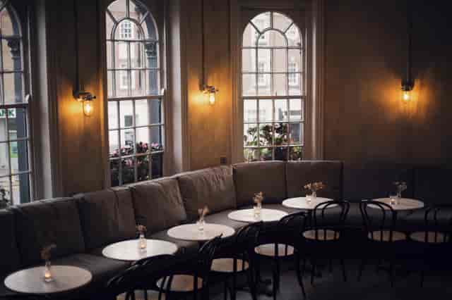 Stylish lounge in The Joker, cozy seating for networking events and gatherings.