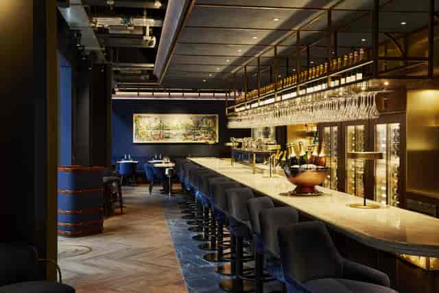 Searcys Champagne Bar at Battersea Power Station, elegant venue for networking events.