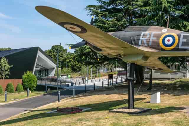 Visitor Center at Battle of Britain Bunker with vintage aircraft, ideal for corporate events.