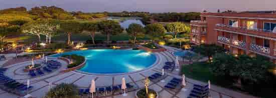 Serene outdoor event space with pool at Quinta Da Marinha Hotel, ideal for gatherings.
