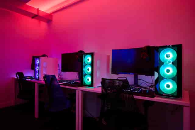 Modern gaming venue with RGB PCs, perfect for esports tournaments and gaming conventions.