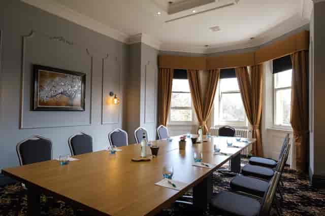 Longmoor Room at Moor Hall Hotel, elegant meeting space with natural light for professional events.