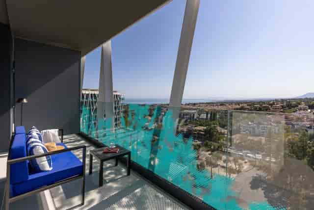 Modern balcony with stunning views at Club Med Magna Marbella for networking events.