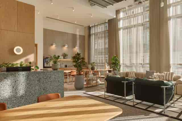 Modern meeting space with large windows, ideal for networking events and conferences.