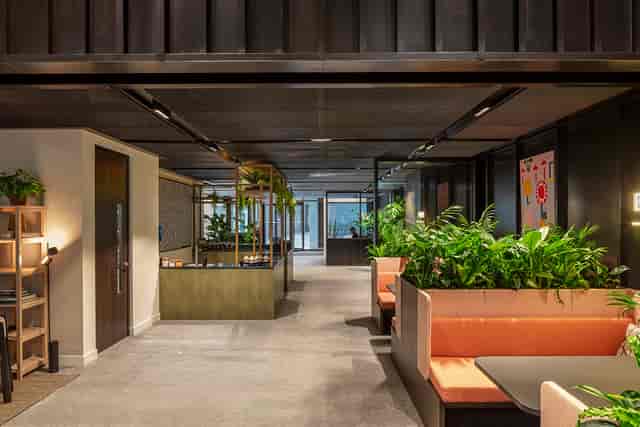 Modern event suite with greenery, ideal for networking and meetings at Myo Bankside.