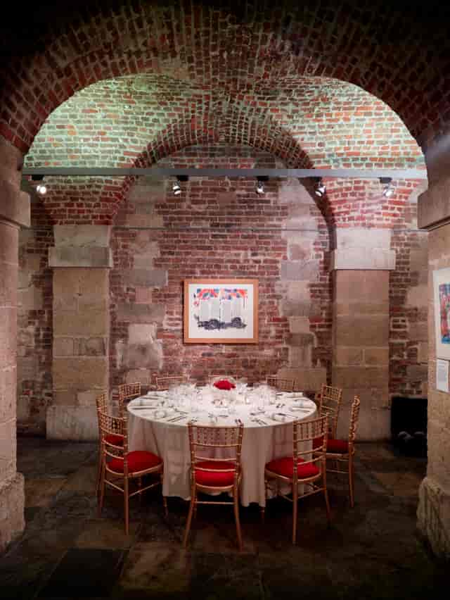 Elegant round table in The Gallery, St Martin-in-the-Fields for upscale events and gatherings.