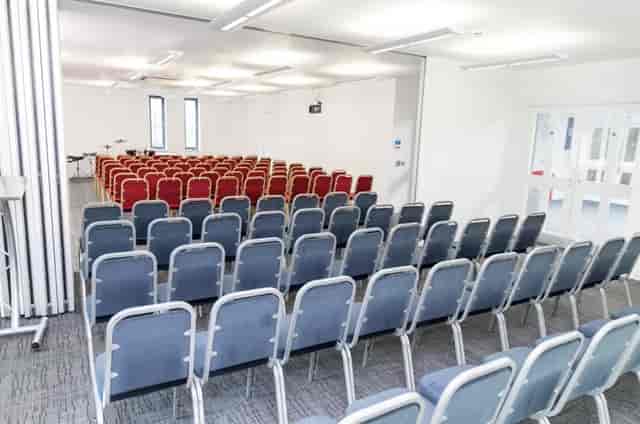 Ruby Suite in Rock Tower, versatile meeting space for events with natural light.