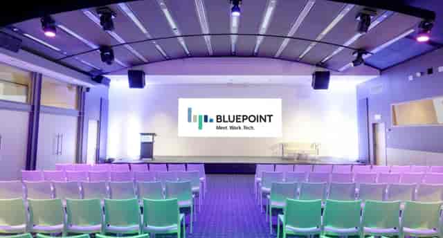 Modern event space at Einstein ABC, Bluepoint Brussels, ideal for corporate presentations.
