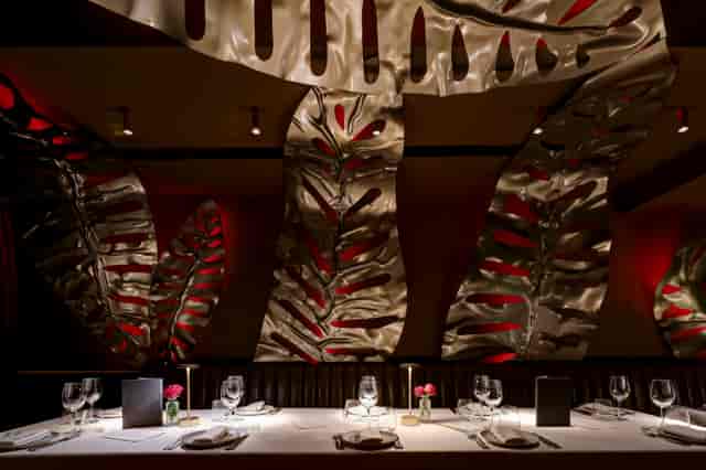 Private dining room in Bocconcino Soho with metallic decor for upscale events.