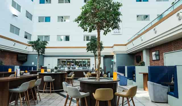 Atrum Bar at Voco Reading: modern venue with greenery for networking events and gatherings.