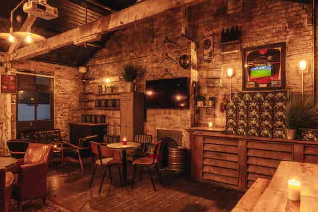 Cozy rustic venue hire in Wolfpack Queens Park for events and meetings.