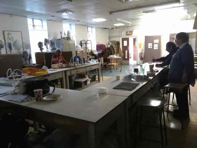 Art studio kitchen with ample workspace for catering events and meal prep.