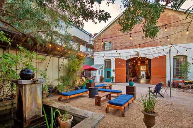 Charming outdoor event space at Huron Substation with cozy seating and string lights.