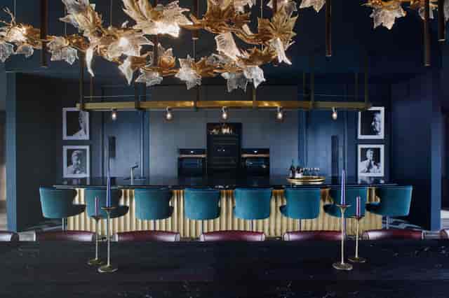 Exton Hall event space with teal seating, ideal for upscale cocktail receptions.