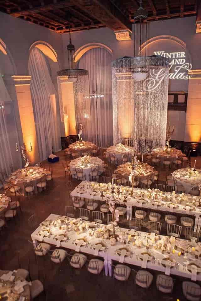 Elegant event space at The Majestic with round tables, ideal for weddings and corporate events.