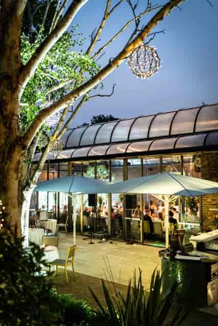 Outdoor dining space at The Conservatory, ideal for events and gatherings.