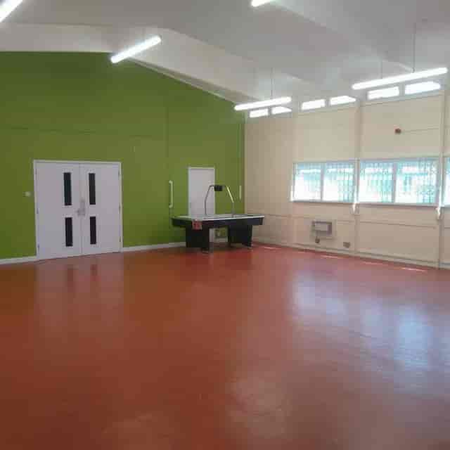 Alpha Grove Community Centre hall with high ceilings, ideal for professional event venue hire.